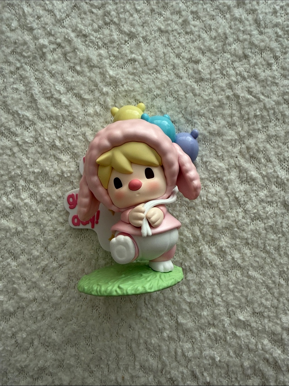 Pink Bunny-Hood Collectible Figurine with Green Base